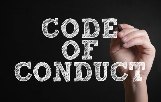 Hand writing Code of conduct on a virtual screen